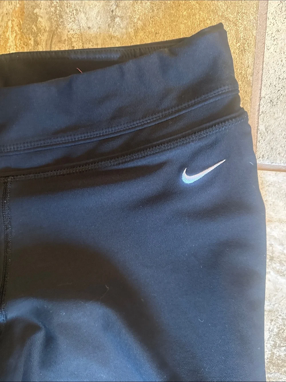 Nike Women’s Black Capri Workout Leggings - loose at knee - with White Swoosh